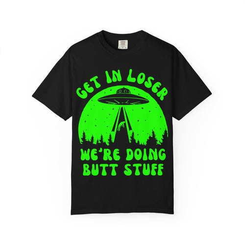 Black t-shirt with green alien abduction graphic and text on a white background